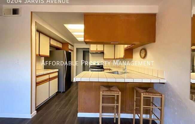 6204 JARVIS AVE