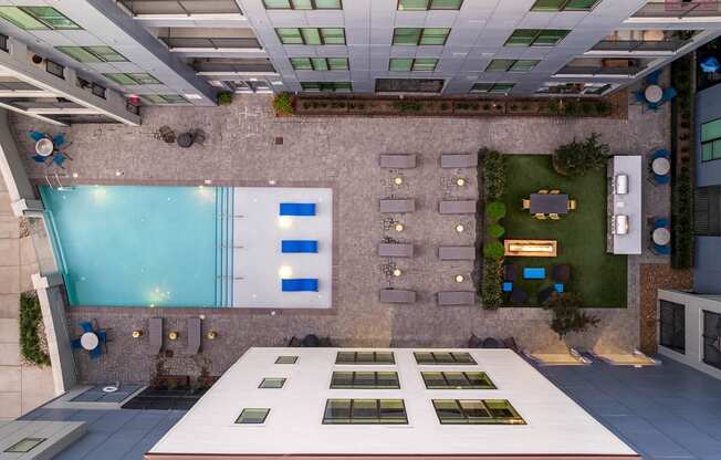 a rendering of the lobby of a building with an indoor pool