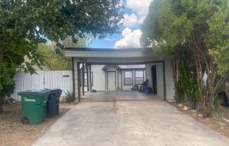 Large 2/2 duplex with a 2 car carport
