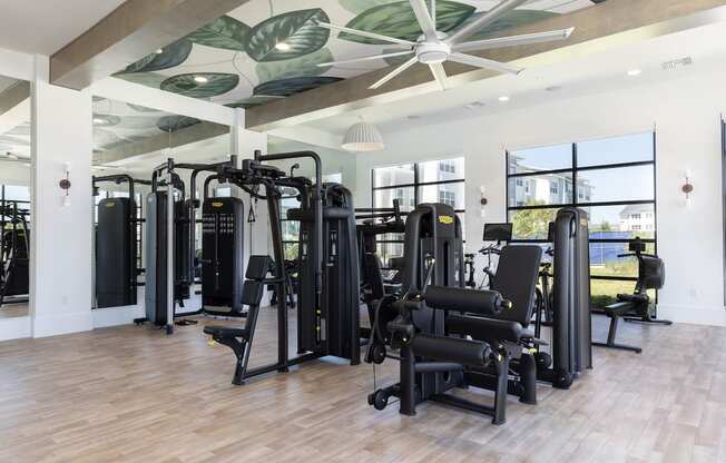 large fitness center with strength and cardio equipment at Lake Nona Concorde