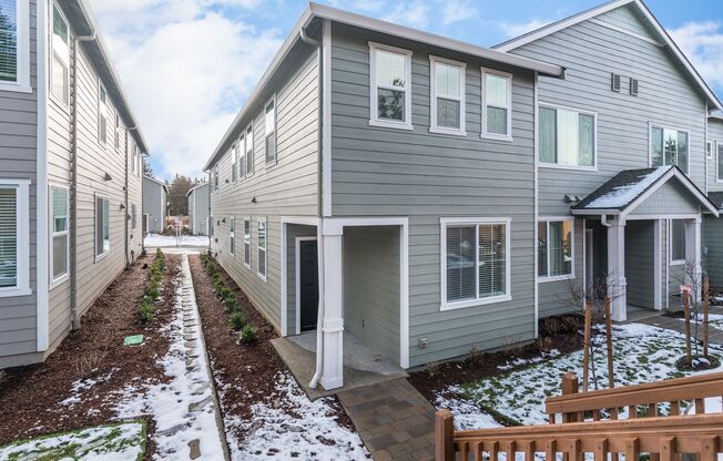 Super clean & spacious 4-bdrm/3-bath townhome in NE—Attached garage, great location
