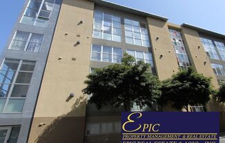 EPIC REA: Spacious Live/Work  Loft in SOMA with Rooftop Views