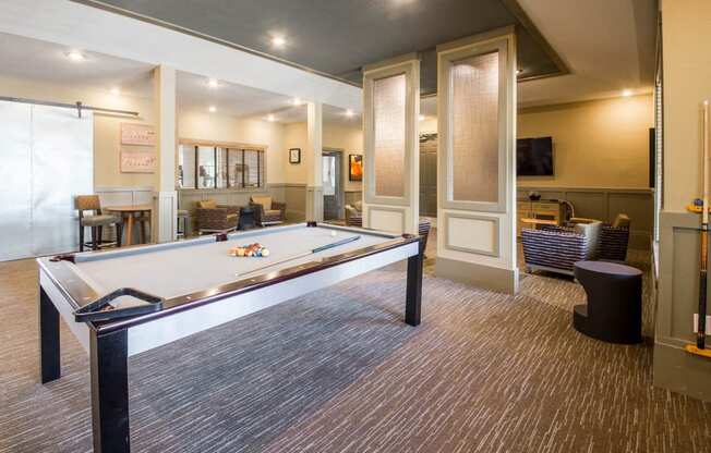 Game Lounge with pool table and separated lounge seating