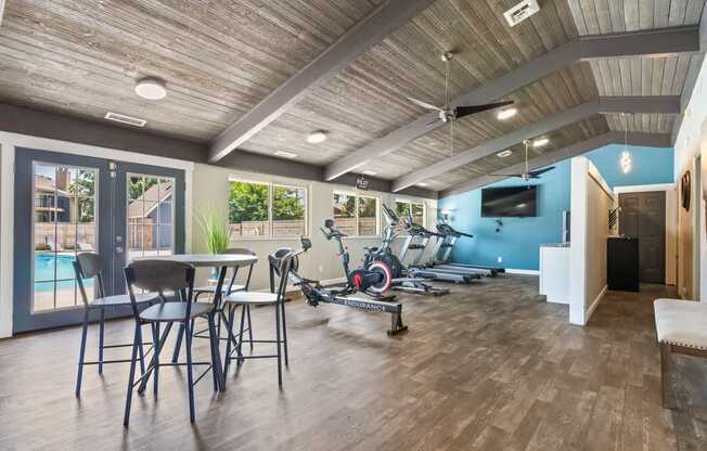 the residence on lamar apartment homes fitness room with exercise bike and table