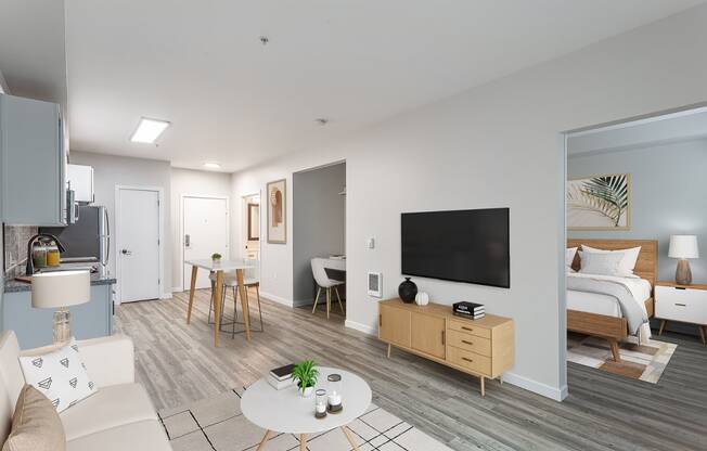 a bedroom with a bed and a living room with a couch and a coffee table