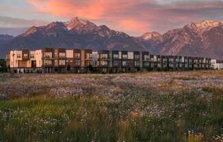 Beautiful Sunset Mountain View Outside at  Parc View Apartments and Townhomes Midvale, UT 84047