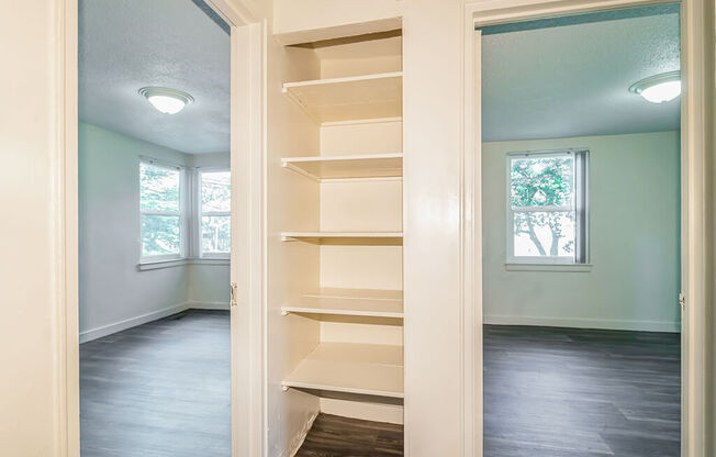 Hallway with shelving at Sutterfield Apartments in Providence RI