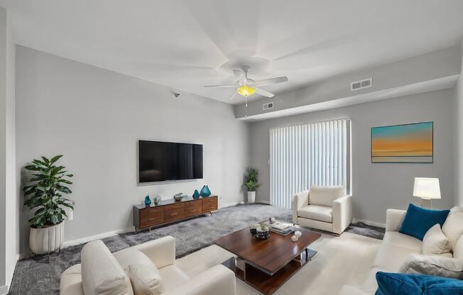 a living room with couches and a coffee table