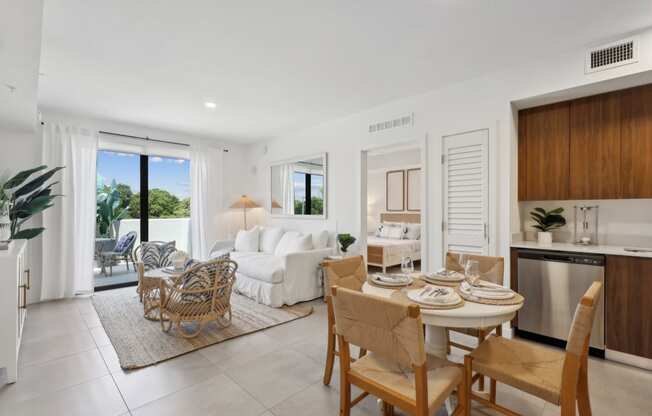 Living Room in B1 Floor Plan with white couch at Westgate on University in Lauderhill, FL