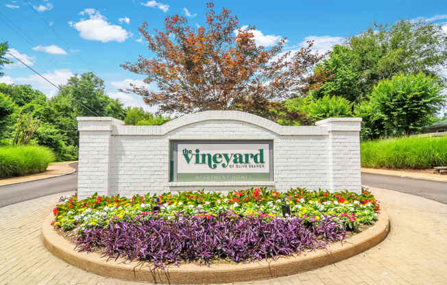 the sign at the entrance to the vinyard neighborhood