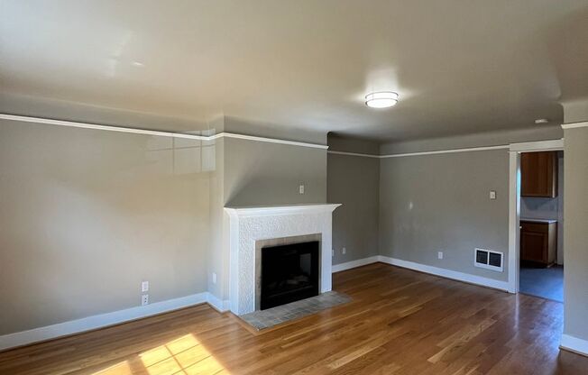 Gorgeous 2-Bedroom Townhome! Hardwood Floors, Private Basement, Garage & Fenced Backyard!