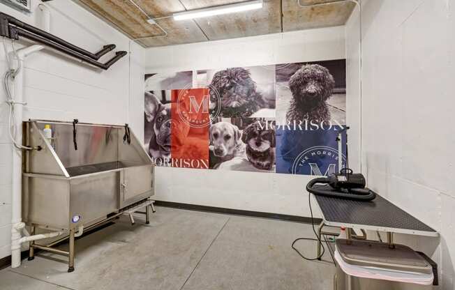 a large mural of dogs on a wall in a laundry room