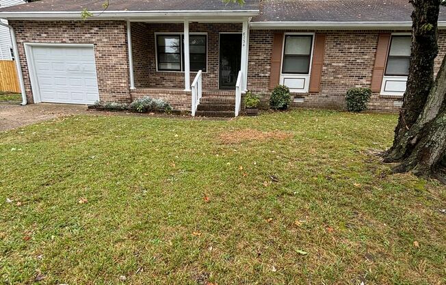 Beautiful Brick Ranch Style Home Features 3 Spacious Bedrooms and 2 Bathrooms