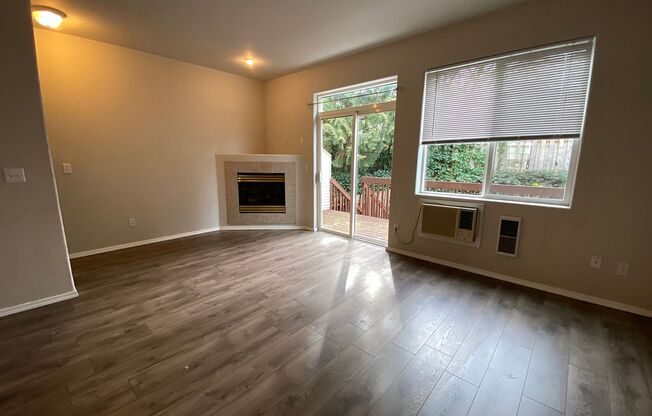 Fantastic Townhome with Gas Fireplace, Deck, Fenced Yard, and Vaulted Ceilings