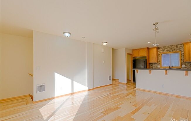 Charming 3-Story townhome located near Highland Park.