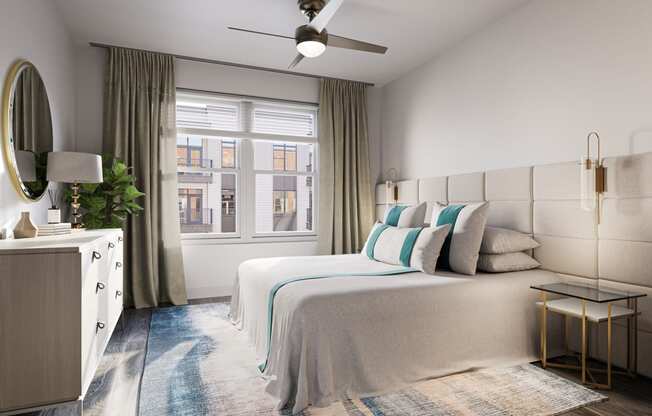 a bedroom with a bed and a window at Link Apartments® Broad Ave, Memphis, Tennessee