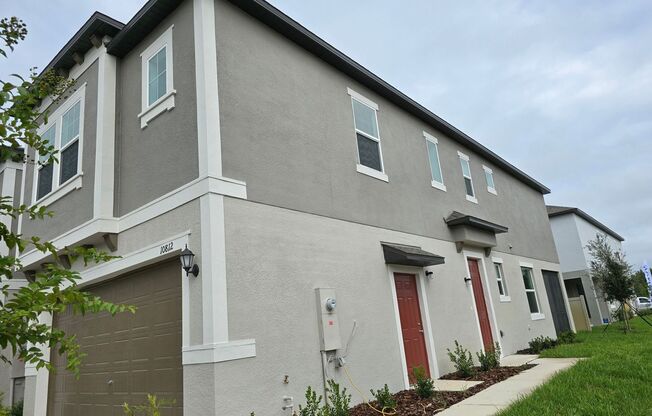 Brand New Corner Lot Townhome in New Community Located in New Tampa!