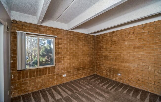 Exposed brick walls and ceiling beams