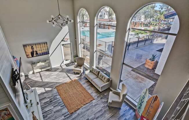 a view of the pool from the upstairs living room