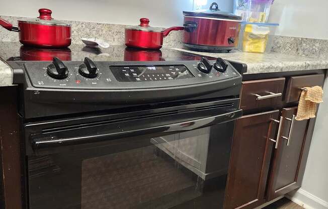 Modern kitchen with black oven at The Assembly Apartments, Greenville
