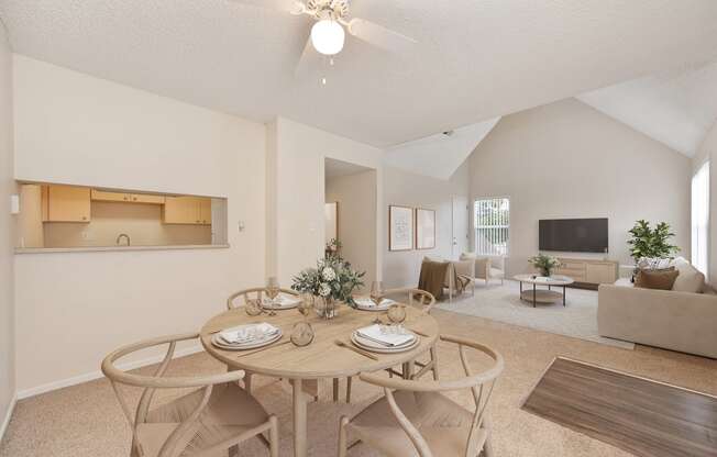 a dining room with a table and chairs at Vineyard Terrace Apartments, California, 94558