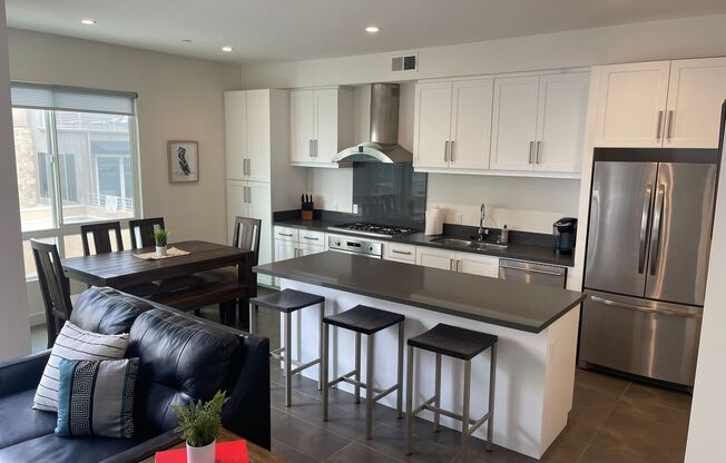 Water views! Less than a block from the ocean! 2 Bed 2.5 Bath Townhome!