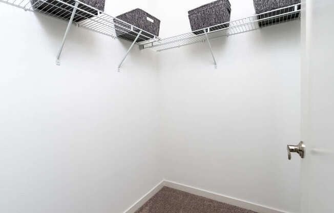 A white door is closed with a silver handle.