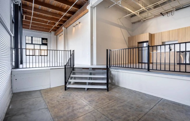 a flight of stairs in an empty room