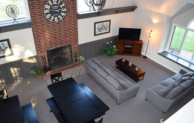 Fireplace In Clubhouse Lounge Area at Indian Lakes Apartments, Mishawaka, Indiana