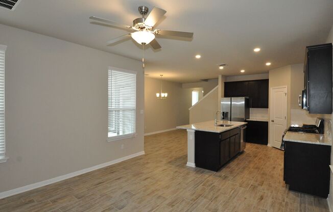 Enjoy a lock and leave lifestyle in this brand new cottage style home at The Retreat at Hero Way