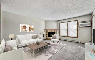 a living room with white furniture and a fireplace at Creekstone Falls, Sioux Falls, SD, 57106