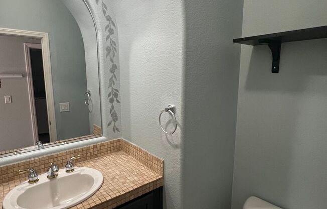 Spacious 4-Bedroom Mountains Edge Home with Downstairs Suite, Balcony & Covered Patio