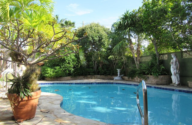 PRICE REDUCTION!! Furnished 2 bed/2 bath Home with Pool and on Canal