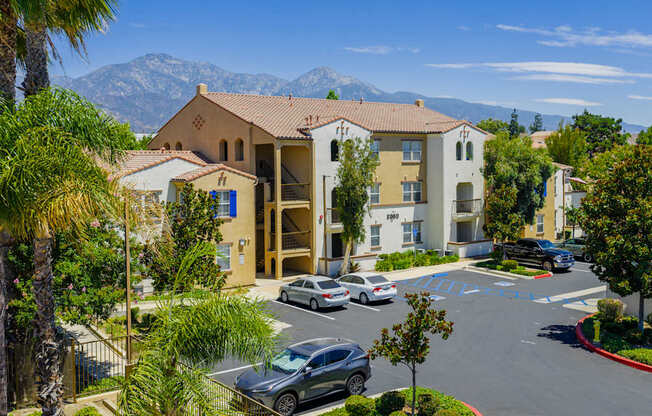 A view of a resort with a mountain in the background.