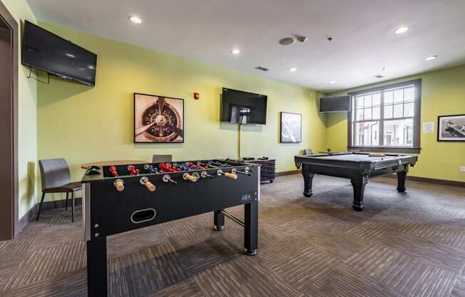 our apartments have a game room with a foosball and ping pong table