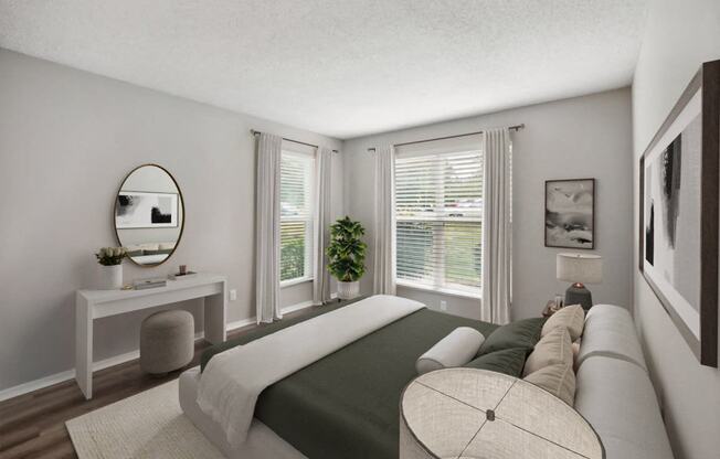 a bedroom with a large bed and a large window at Chapel View Apartments in Chapel Hill, NC