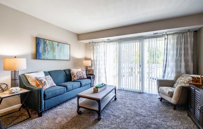 Living Room With Expansive Window at The Crossings at White Marsh Apartments, Maryland, 21128