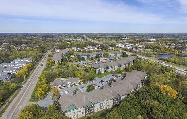 Ariel View of the White Bear Woods Apartment Community Nestled In Amongst the Trees