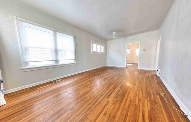 Very nice single family home with refinished hardwood and a very large open living room.