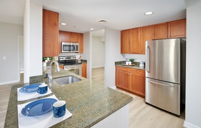 Newly Renovated Kitchen With Wood-Style Flooring Throughout