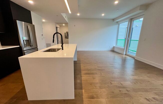 Stunning 2-Bed/2-Bath Condo with One-Car Garage and Rooftop Deck! Available NOW!