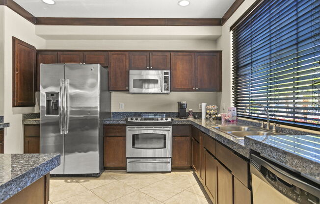 A large kitchen clubhouse ready for gatherings at Adiamo Palm Valley, Arizona, 85395