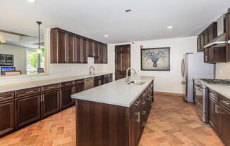 a kitchen with a tile floor