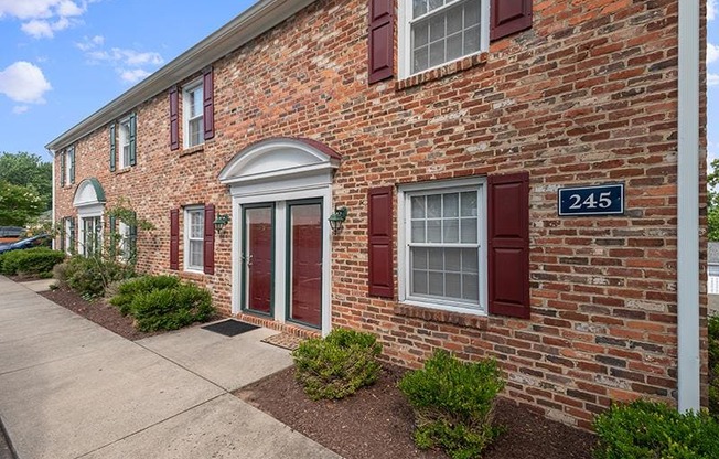 Brick exterior entrance at Barracks West in Charlottesville, VA