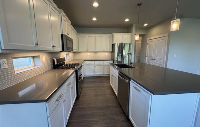 6566 NE Rainsong Lane ~ Magnificent 2-Story Home