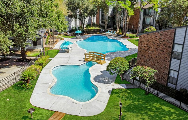 Driscoll Place | Houston, TX | Aerial Image of Swimming Pool with Bridge