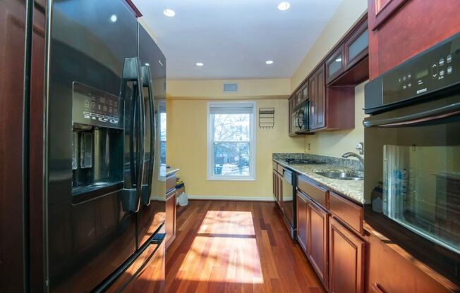 Bright 3 Bedroom Takoma Townhome with Parking, Yard, and Flexible Lower Level