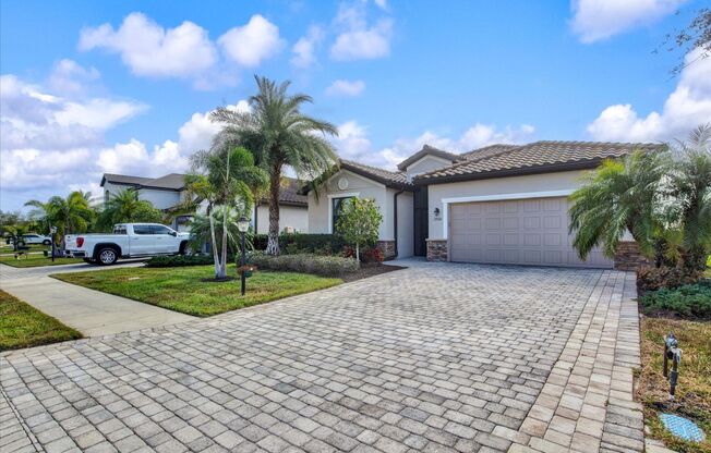 4 Bedroom 3 Bathroom Pool Home with a Pond View in a Gated Community