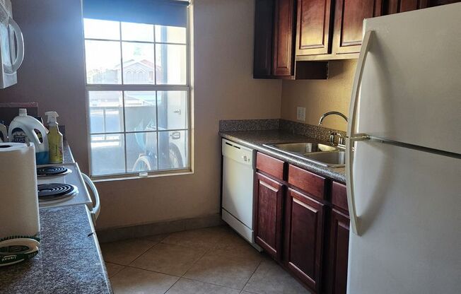 Welcome to this second floor condo in a gated community!