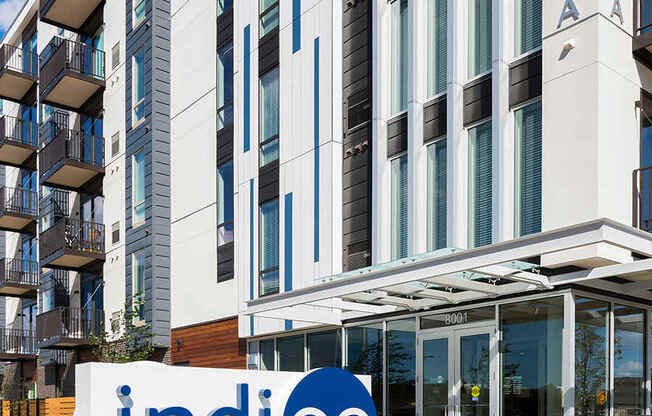 Indigo Monument Sign In Front Of Building